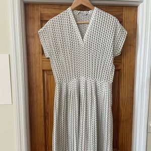 White polka dot pleated midi dress